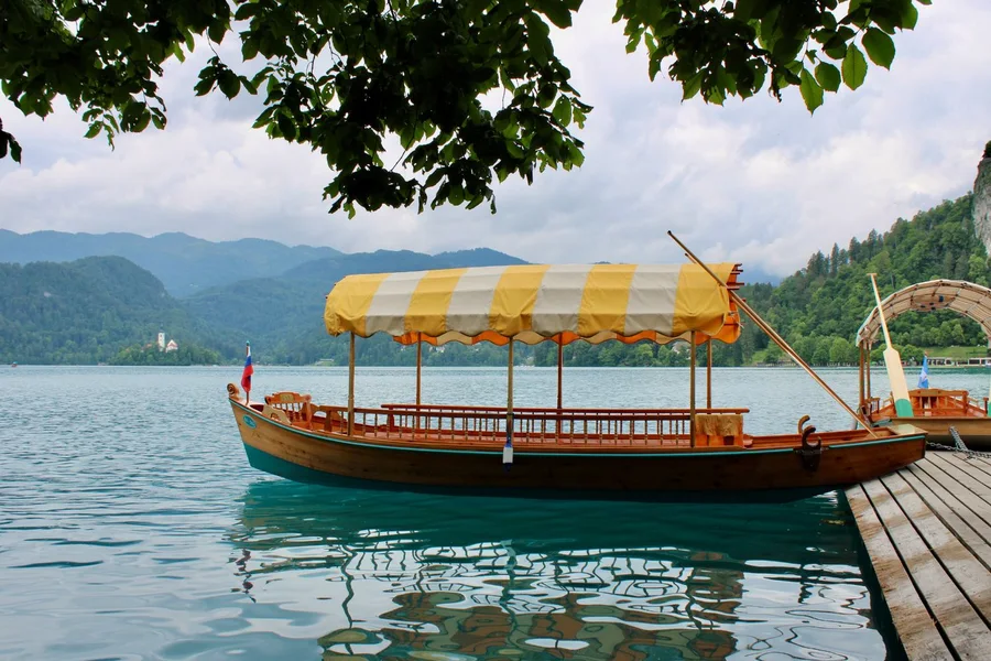 Traditional pletna boat moored on Lake Bled, Slovenia day trip