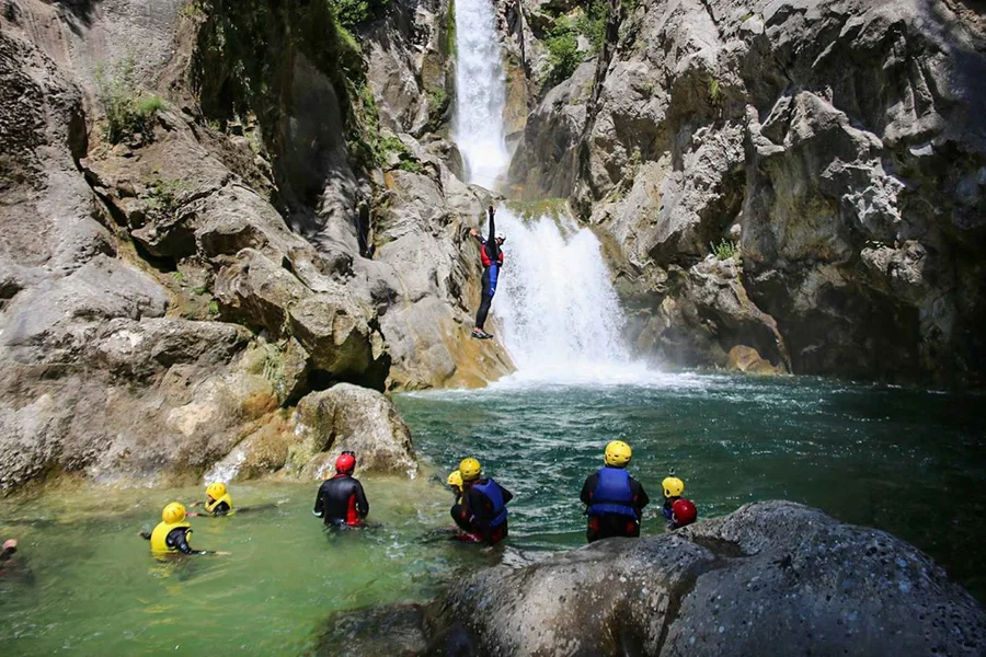 Canyoning down a waterfall on the Cetina River, Croatia