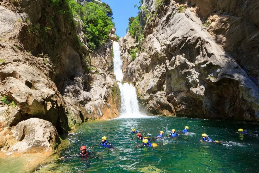 Swimming in the pool below a Cetina river waterfall