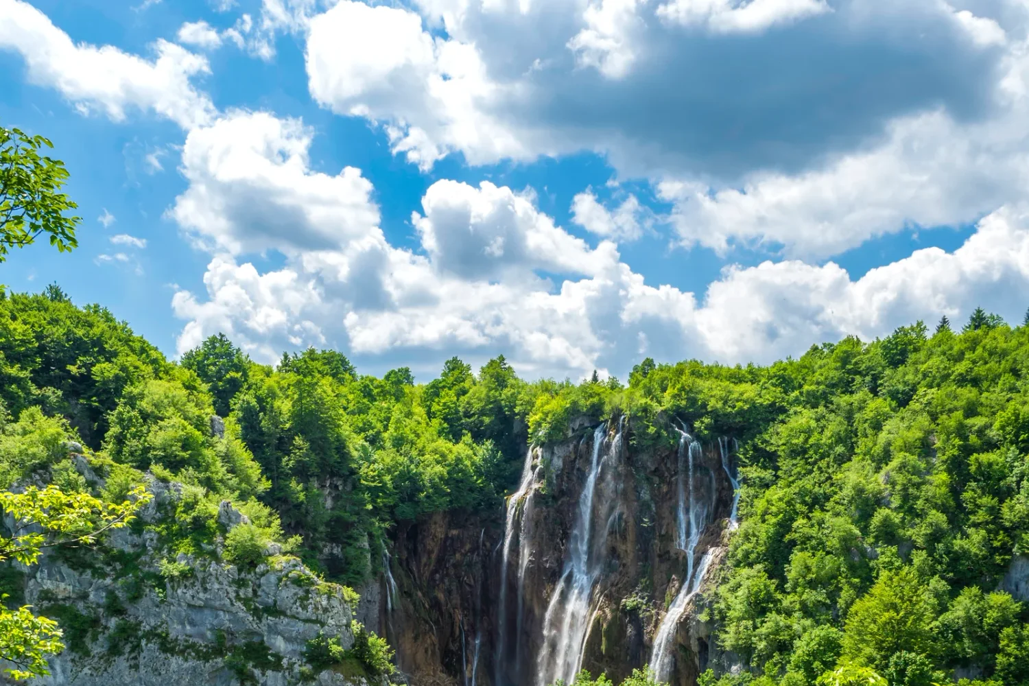 Plitvice Lakes National Park waterfalls under a dramatic sky