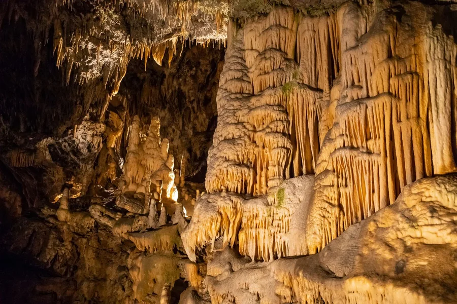 Stalactite formations inside Postojna Cave, Slovenia day trip from Zagreb