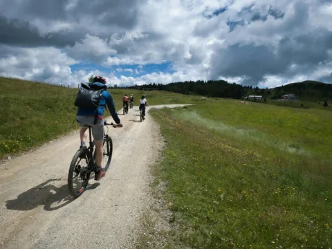 Group cycling a countryside trail in Croatia