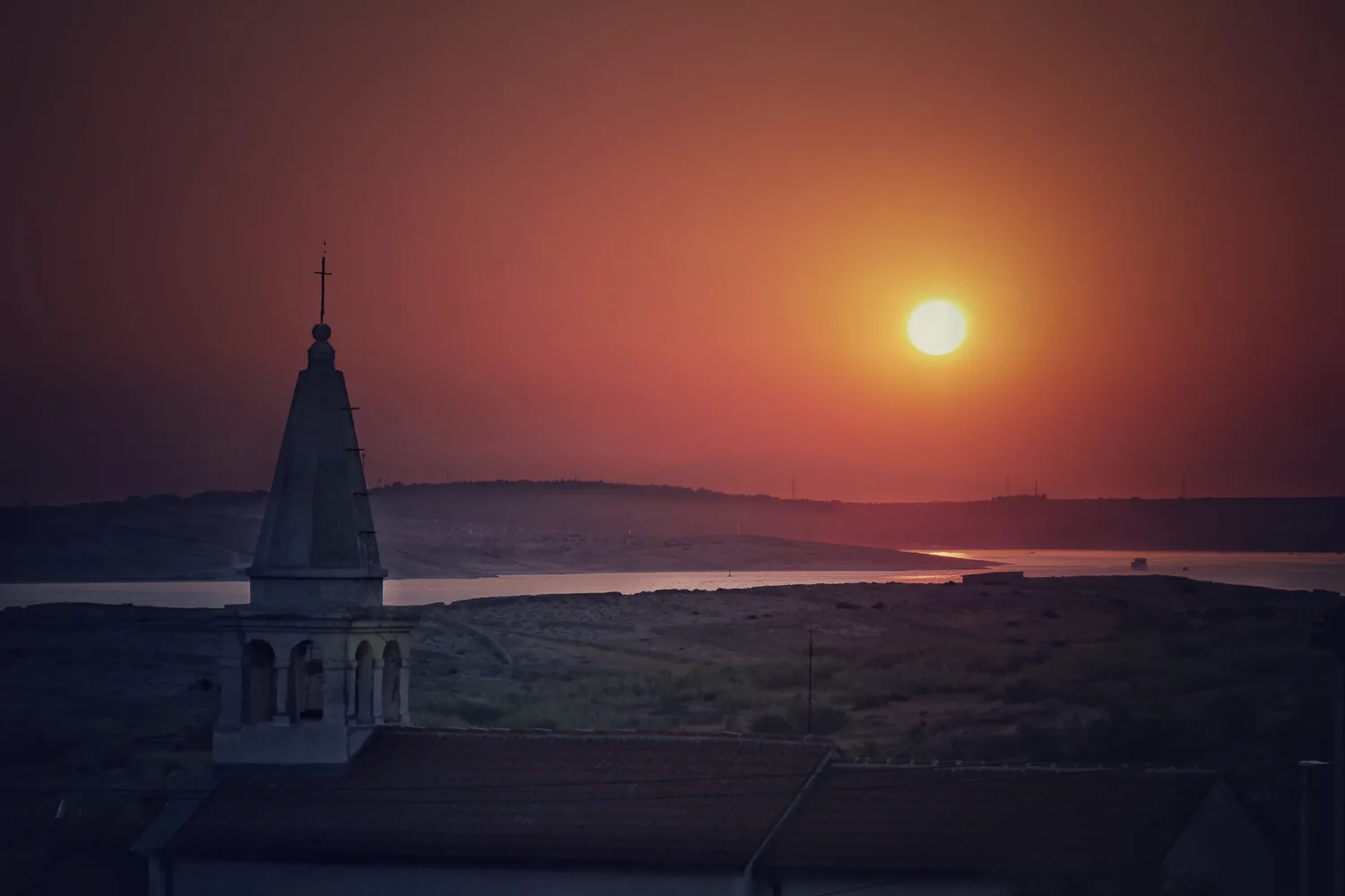Sunset over the bay near Pag town, Croatia